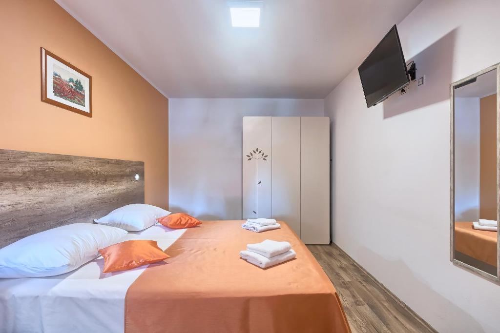 Postel nebo postele na pokoji v ubytování Villa Amber