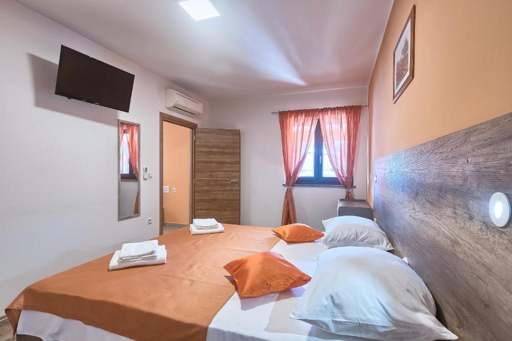 Postel nebo postele na pokoji v ubytování Villa Amber