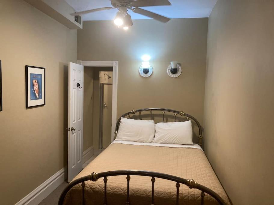 a bedroom with a bed with a ceiling fan at Queen Bed w private ensuite bathroom in Lakeview - 3d in Chicago