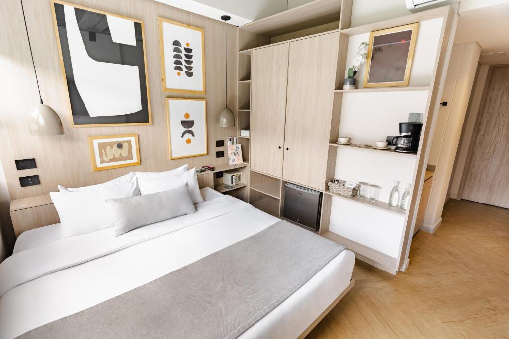 Postel nebo postele na pokoji v ubytování Nakúa Stay & Work