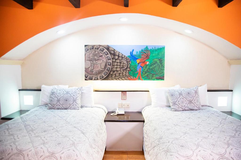 Postel nebo postele na pokoji v ubytování Hotel Catedral