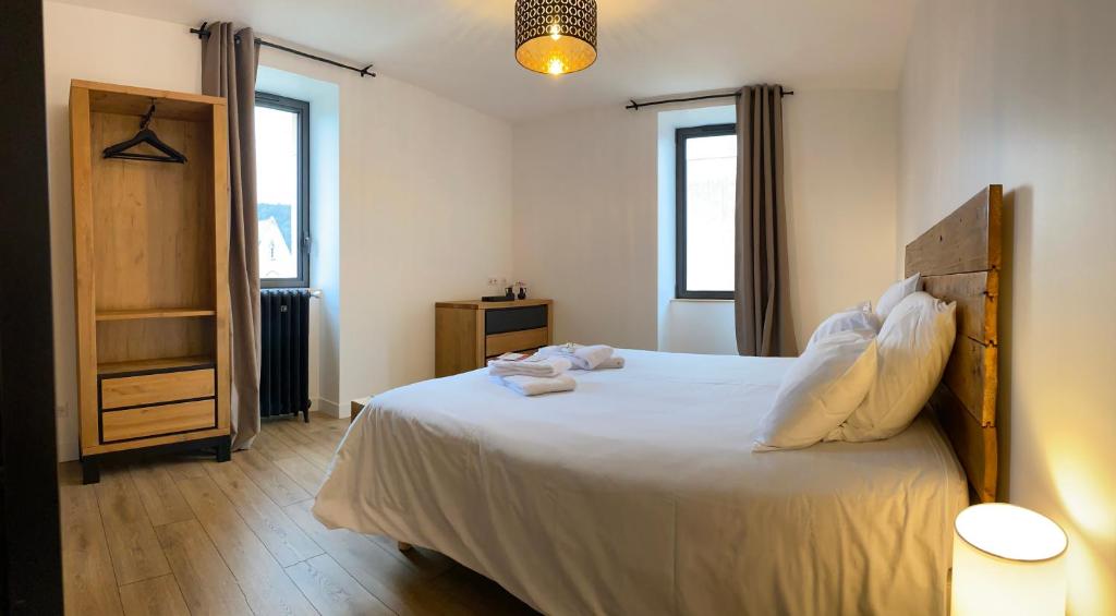 Postel nebo postele na pokoji v ubytování La Bellours Chambre D'Hôtes