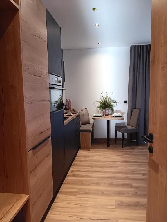 Kuchyň nebo kuchyňský kout v ubytování Feiserhof Navis - Appartements