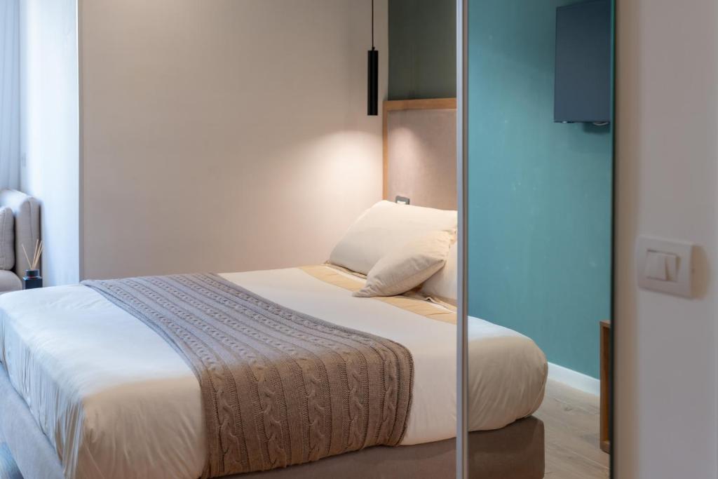 Posteľ alebo postele v izbe v ubytovaní B&B Amadema