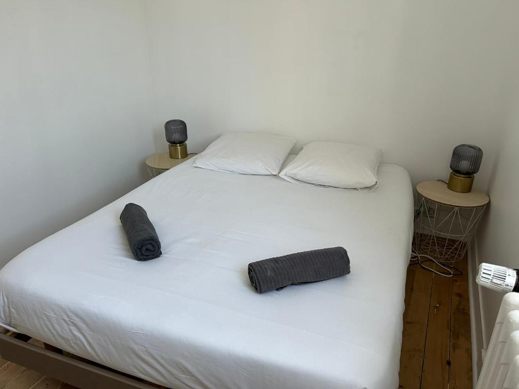 Postel nebo postele na pokoji v ubytování Grande maison de pêcheur - centre de Trouville