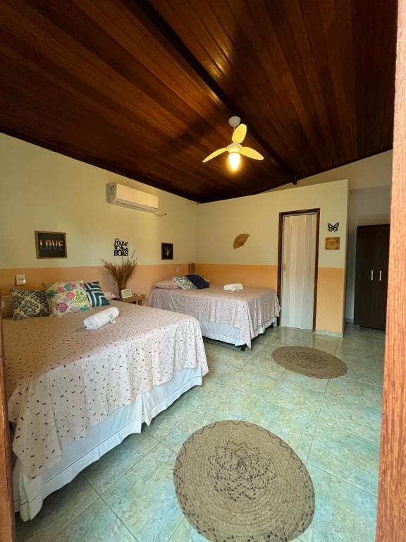 Postel nebo postele na pokoji v ubytování Chales Canto dos Pássaros Boipeba