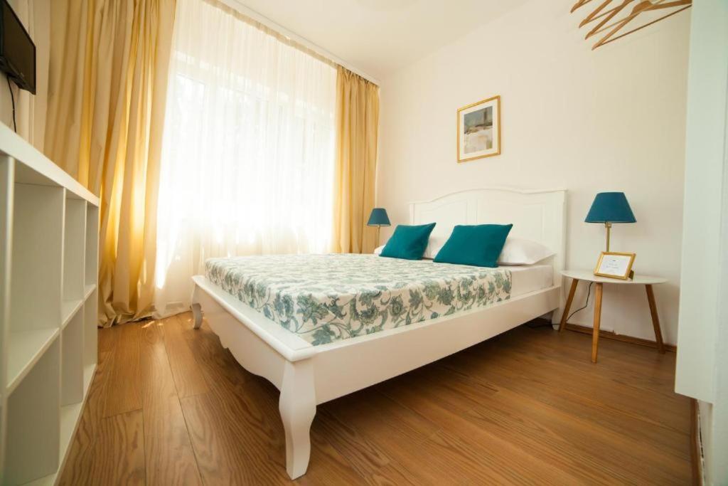 Postel nebo postele na pokoji v ubytování Guesthouse Smart