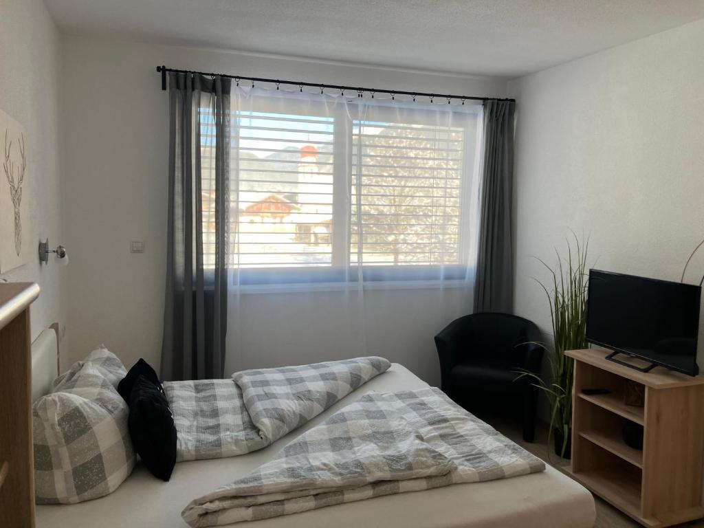 A bed or beds in a room at Apart Katja