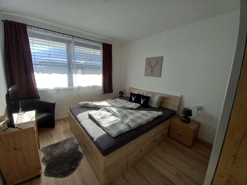 A bed or beds in a room at Apart Katja