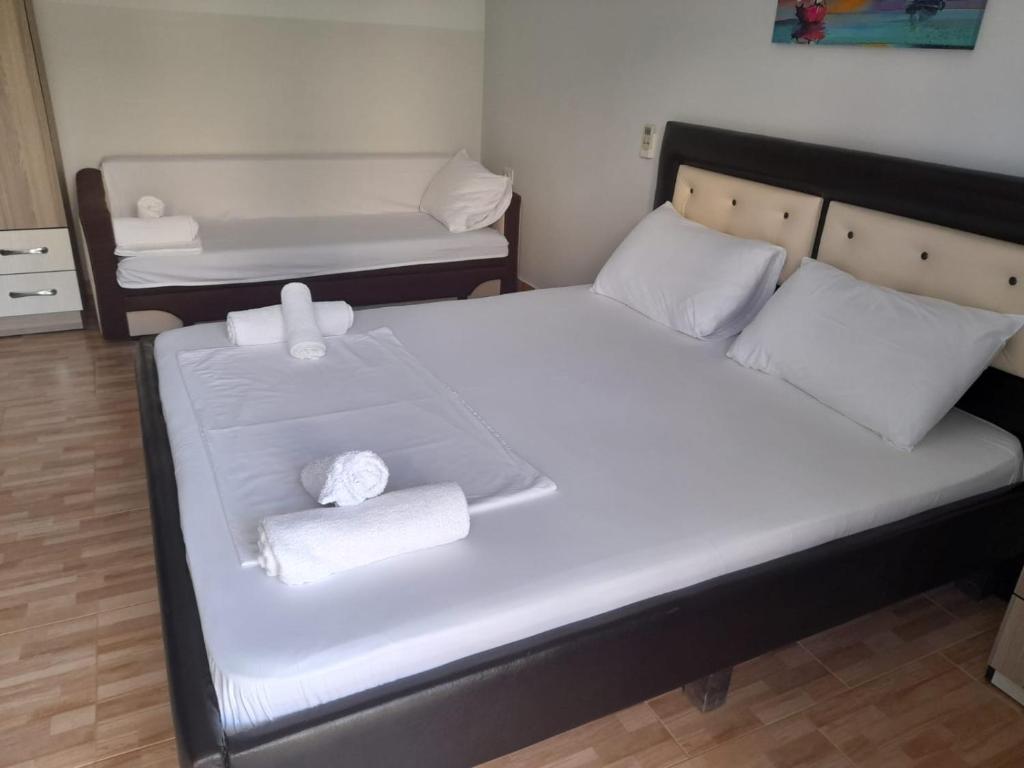 Letto o letti in una camera di Guesthouse Noan&Yliona