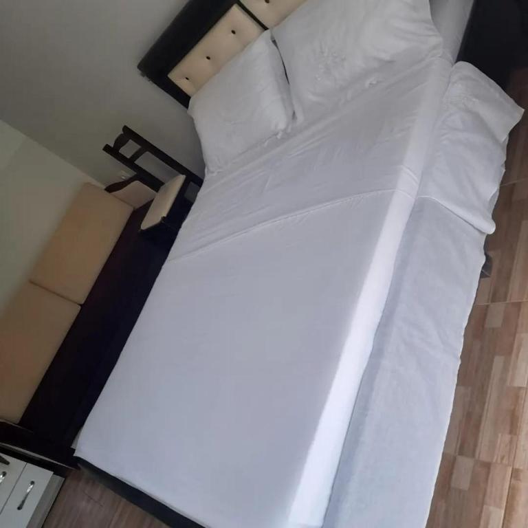 Letto o letti in una camera di Guesthouse Noan&Yliona