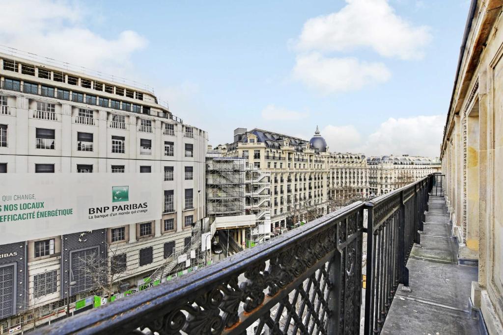 a view of a city from a bridge at CMG - Residence OpéraGrands Magasins in Paris