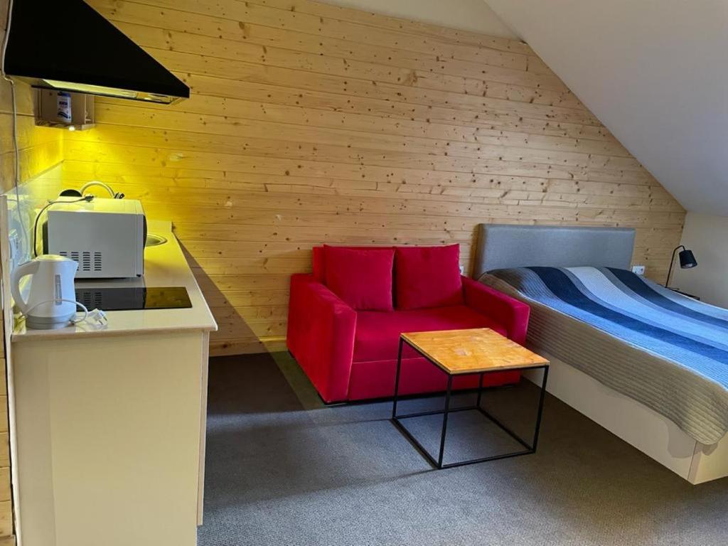 Postel nebo postele na pokoji v ubytování Evdo Apartments Mansard in Suite