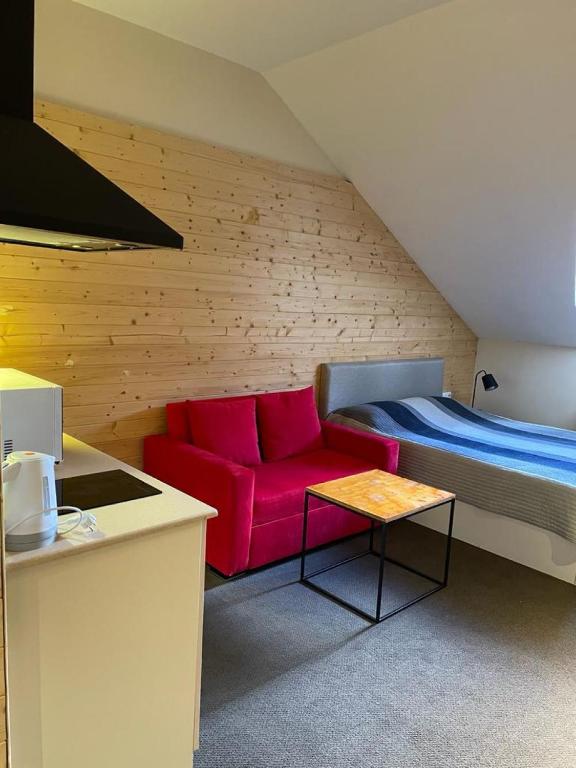 Postel nebo postele na pokoji v ubytování Evdo Apartments Mansard in Suite