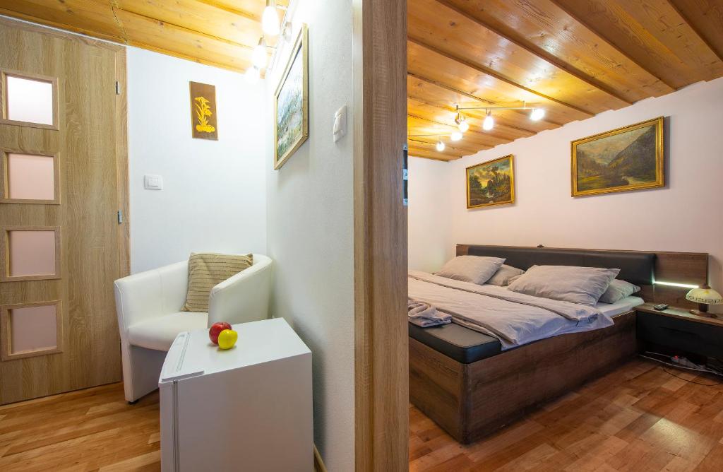 A bed or beds in a room at Wellness Vila Astra