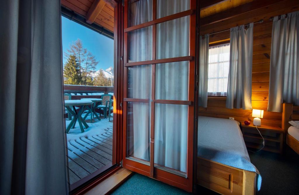 A bed or beds in a room at Wellness Vila Astra