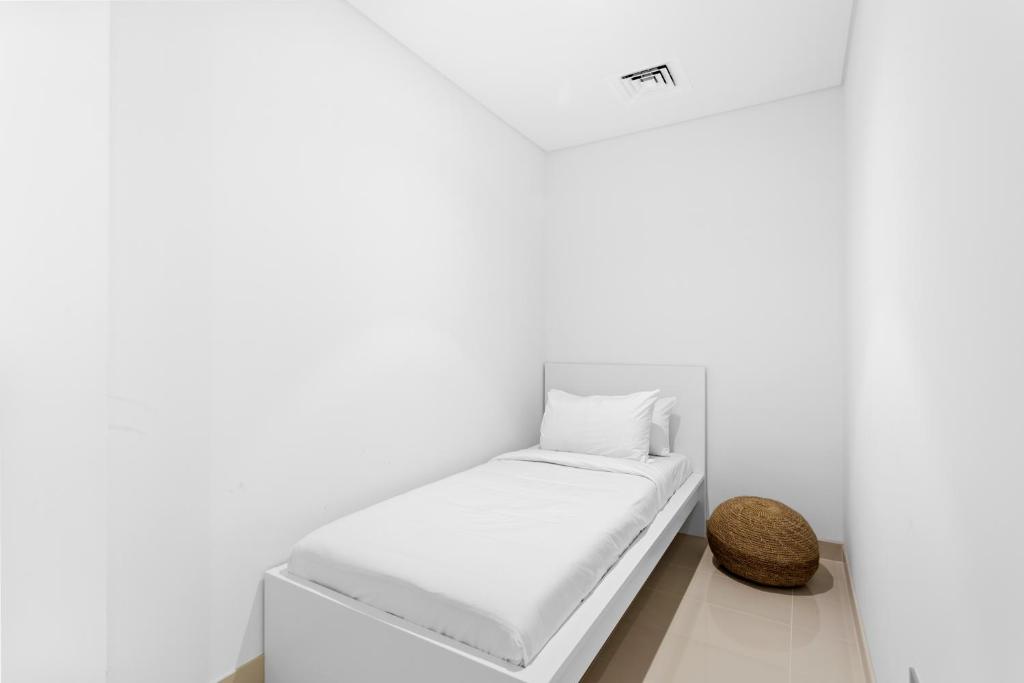 Postel nebo postele na pokoji v ubytování Your beachfront luxe escape experience - Suiteable