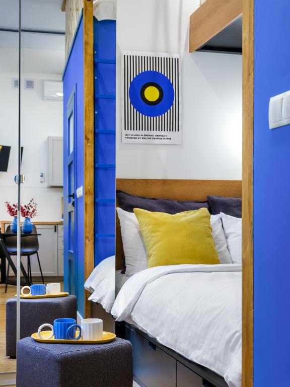 Posteľ alebo postele v izbe v ubytovaní MioMio Apartments