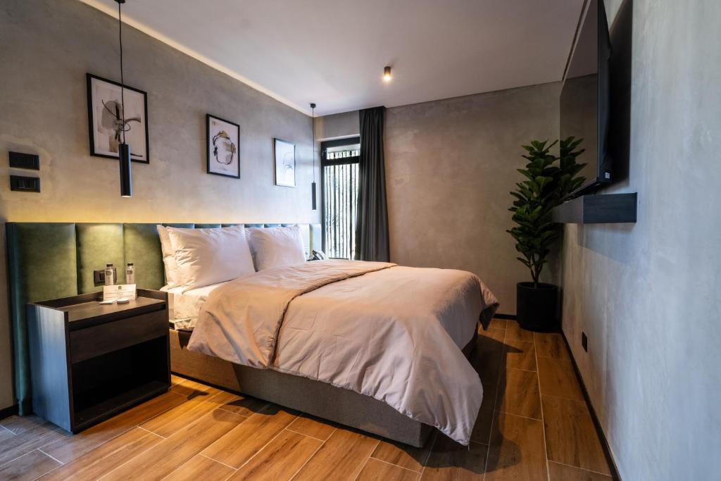 Una cama o camas en una habitación de ALCALÀ EXPO