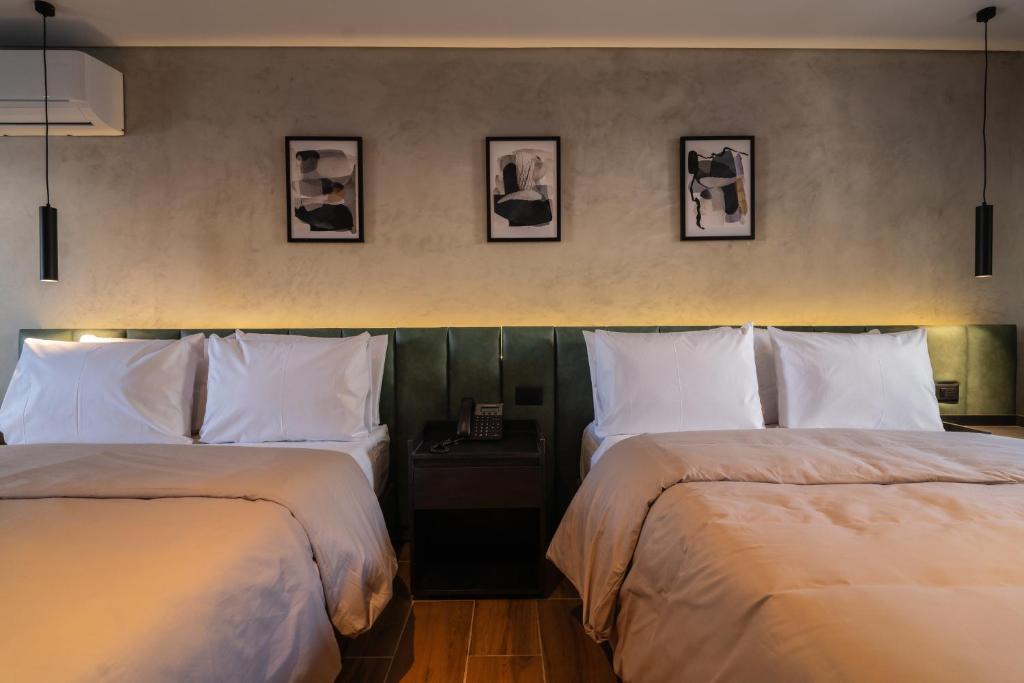 Una cama o camas en una habitación de ALCALÀ EXPO