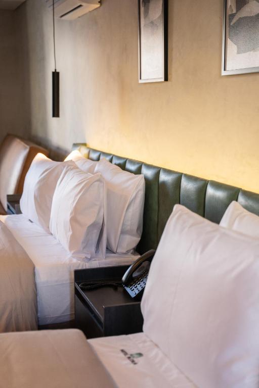 Una cama o camas en una habitación de ALCALÀ EXPO