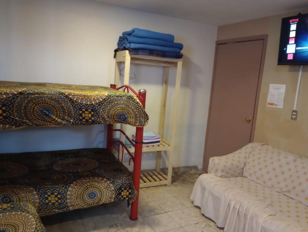 Postel nebo postele na pokoji v ubytování Posada Lindavista