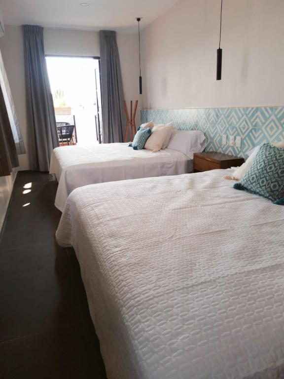 Postel nebo postele na pokoji v ubytování Casa Irake