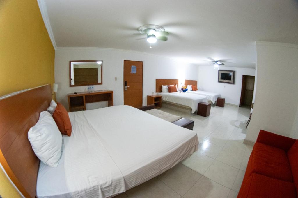Postel nebo postele na pokoji v ubytování Hotel River Poliforum