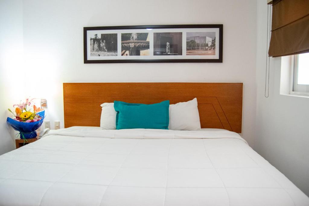 Postel nebo postele na pokoji v ubytování Hotel River Poliforum