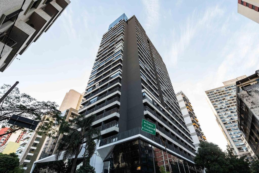 a tall building in the middle of a city at VN Ueno in Sao Paulo