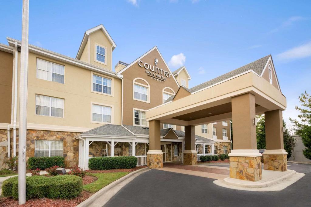 a rendering of a hotel with a building at Country Inn & Suites by Radisson, Norcross, GA in Norcross