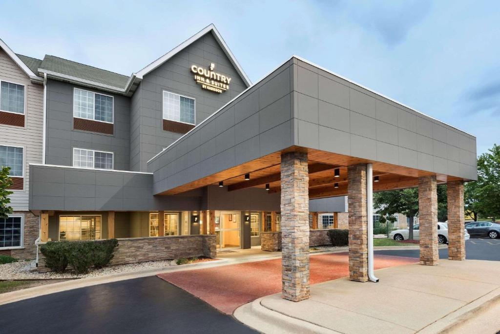 a rendering of the front of a hotel at Country Inn & Suites by Radisson, Romeoville, IL in Romeoville