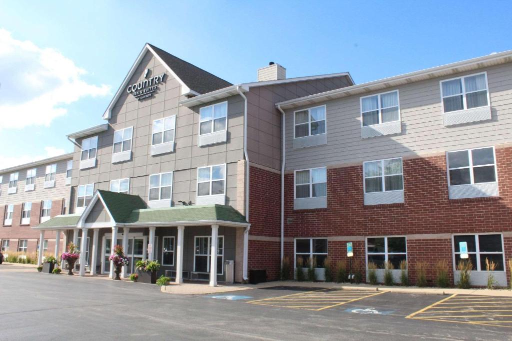 a rendering of a hotel in a parking lot at Country Inn & Suites by Radisson, Crystal Lake, IL in Crystal Lake