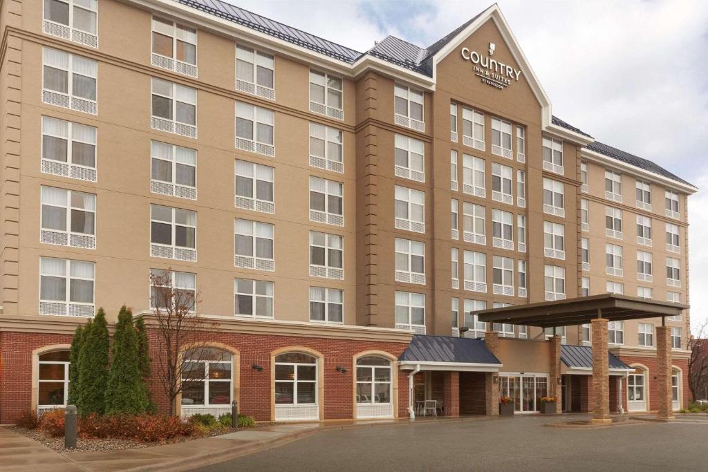 a rendering of a hotel at Country Inn & Suites by Radisson, Bloomington at Mall of America, MN in Bloomington