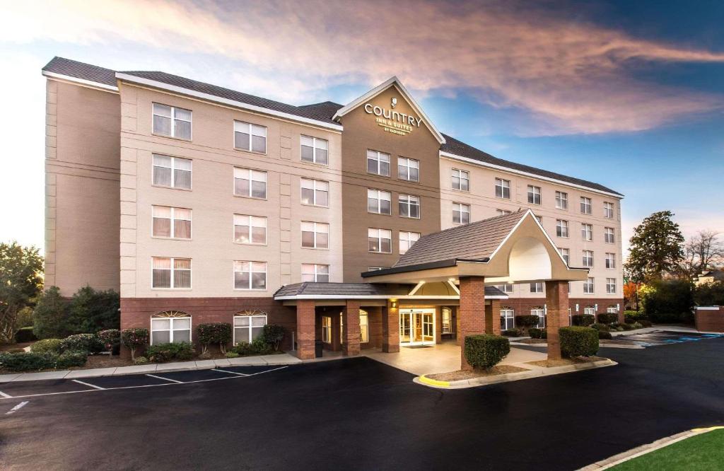 a rendering of a hotel with a parking lot at Country Inn & Suites by Radisson, Lake Norman Huntersville, NC in Huntersville
