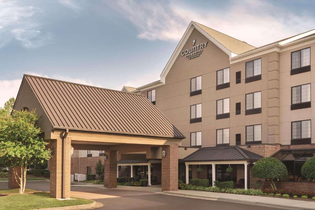 a rendering of the front of a hotel at Country Inn & Suites by Radisson, Raleigh-Durham Airport, NC in Morrisville