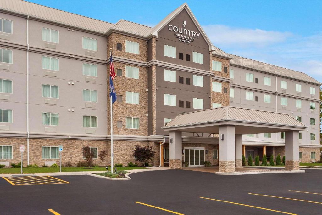 a rendering of a hotel with a parking lot at Country Inn & Suites by Radisson, Buffalo South I-90, NY in West Seneca
