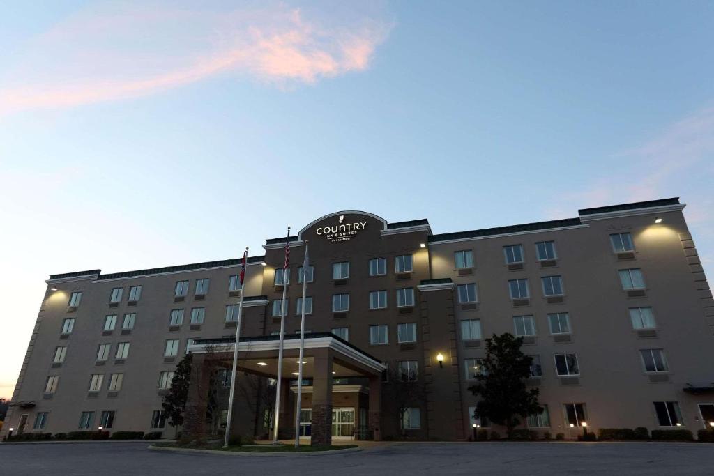 a rendering of a hotel with a building at Country Inn & Suites by Radisson, Cookeville, TN in Cookeville