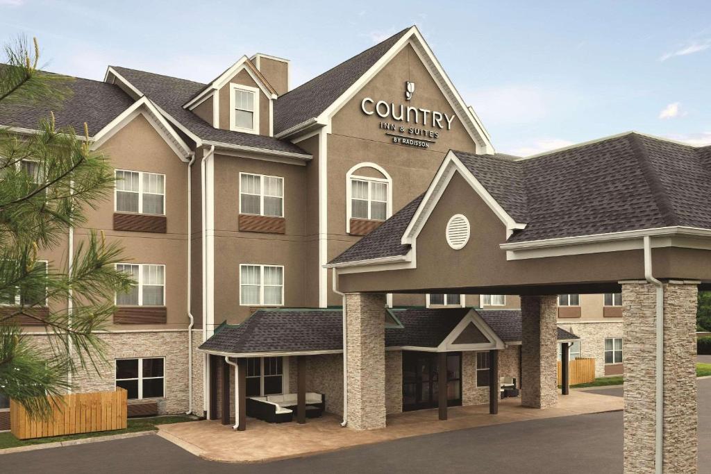 una representación de la parte delantera de un hotel en Country Inn & Suites by Radisson, Nashville Airport East, TN, en Nashville