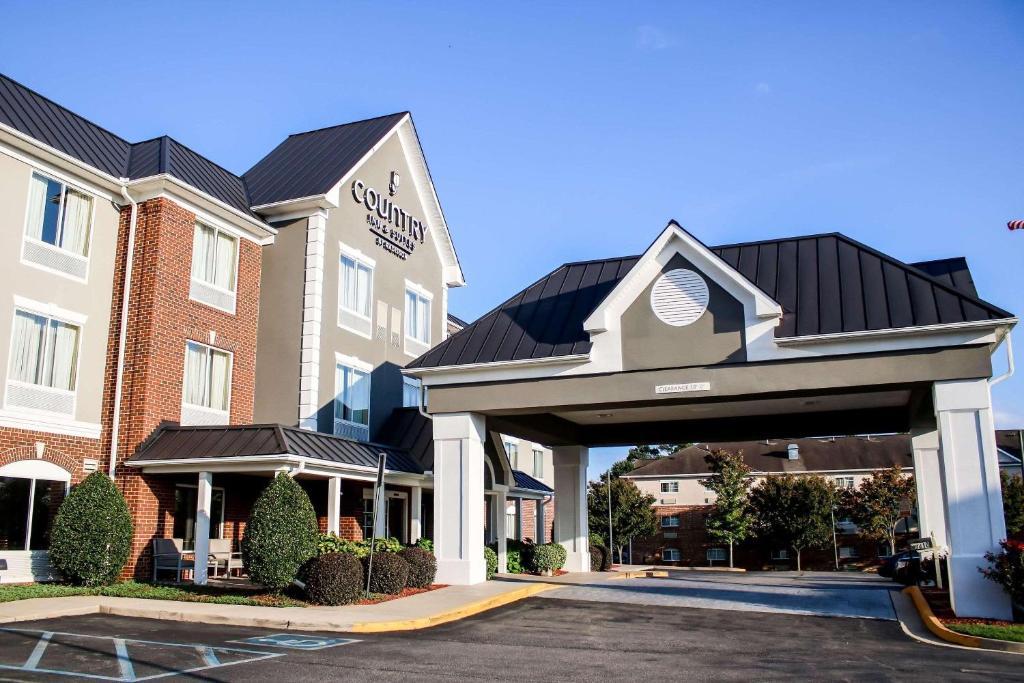 a rendering of a hotel with a parking lot at Country Inn & Suites by Radisson, Richmond West at I-64, VA in Richmond