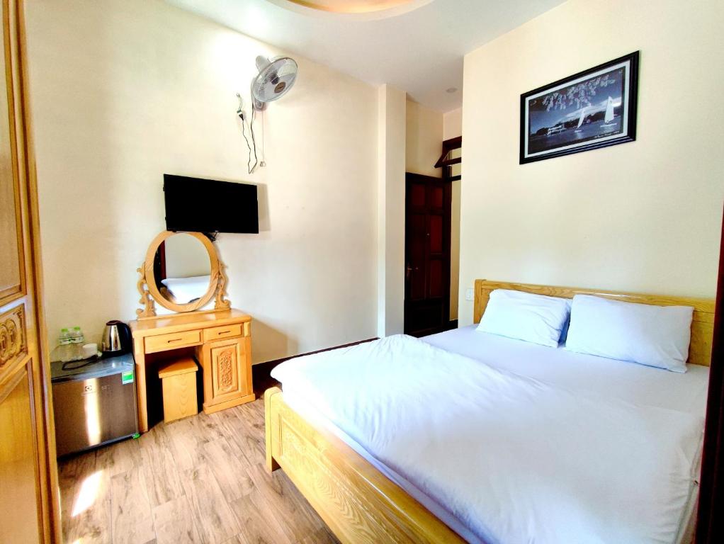 Postel nebo postele na pokoji v ubytování Thảo Nguyên