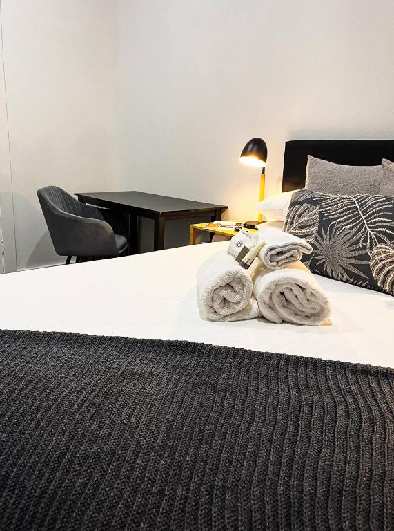 Postel nebo postele na pokoji v ubytování Manjimup Hotel