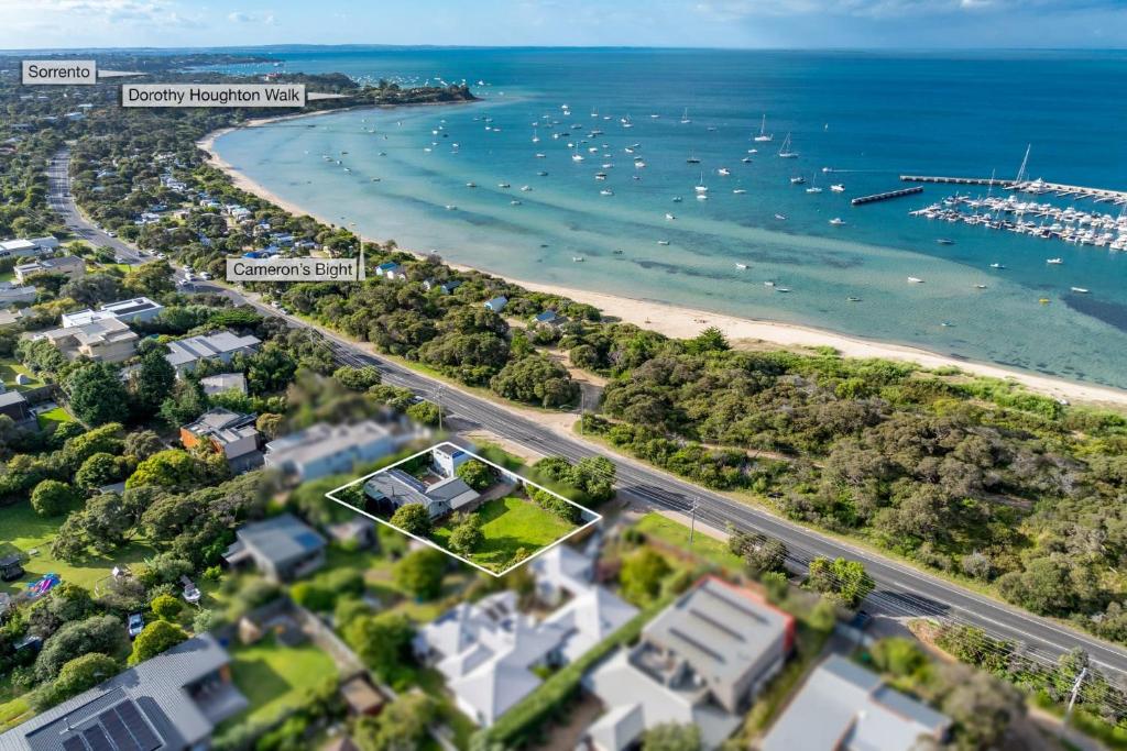 an aerial view of a beach and the ocean at The Buoys in Blairgowrie