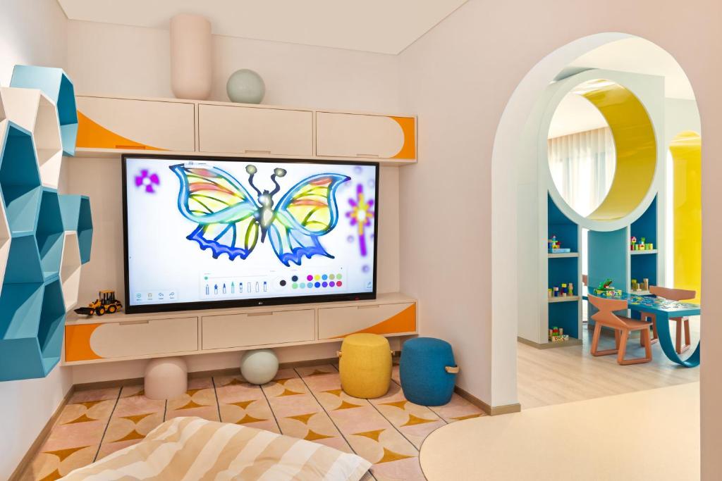 Palace Dubai Creek Harbourにあるテレビまたはエンターテインメントセンター