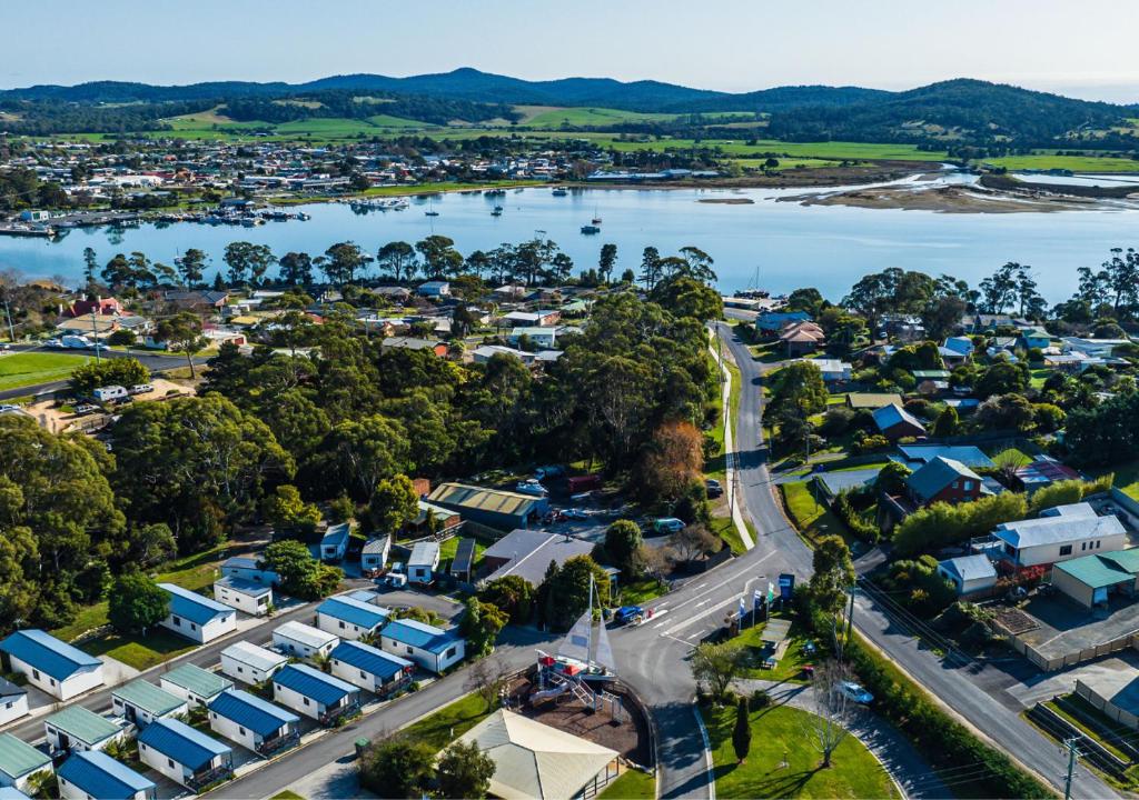 an aerial view of a town next to a body of water at BIG4 St Helens Holiday Park in St Helens