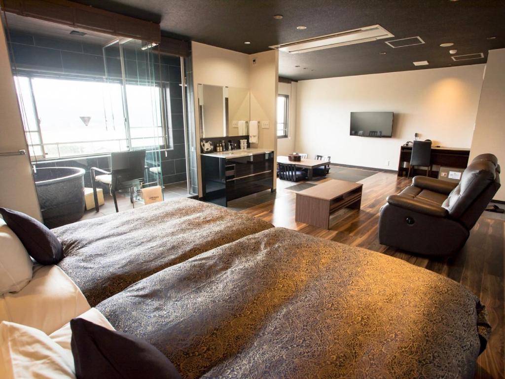 Kuchyň nebo kuchyňský kout v ubytování LiVEMAX RESORT Kyotango Sea Front