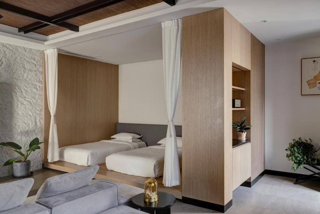Postel nebo postele na pokoji v ubytování Vangen Hotel