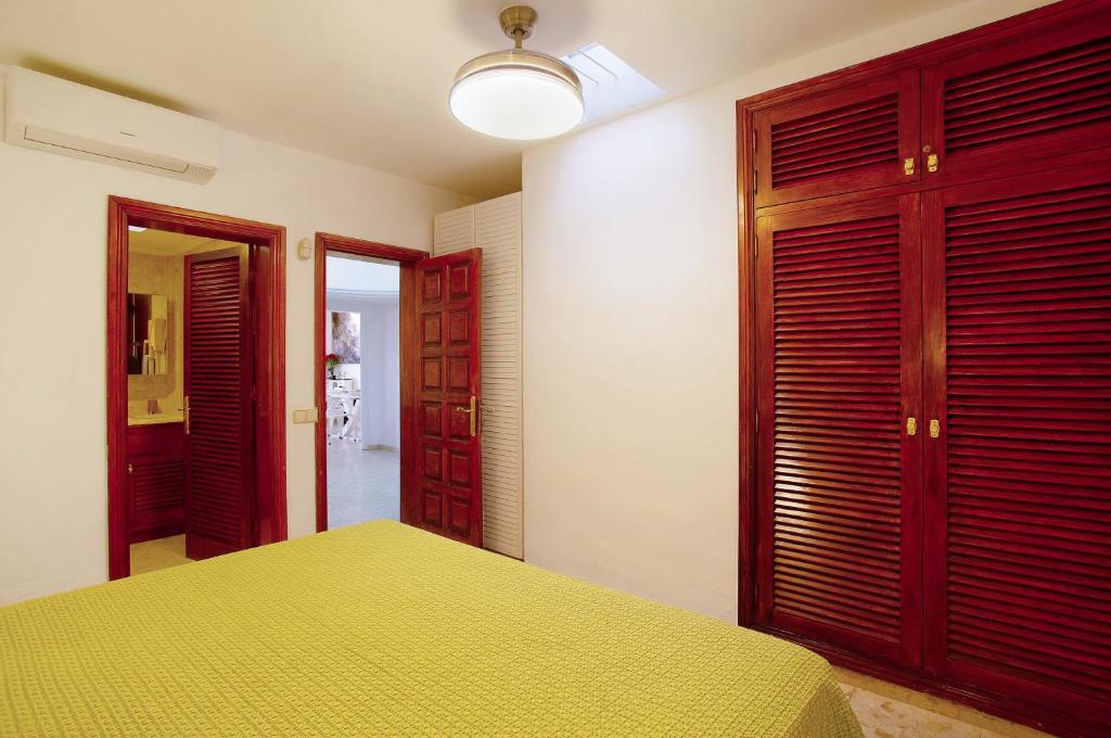 Postel nebo postele na pokoji v ubytování Villa Dunas Maspalomas