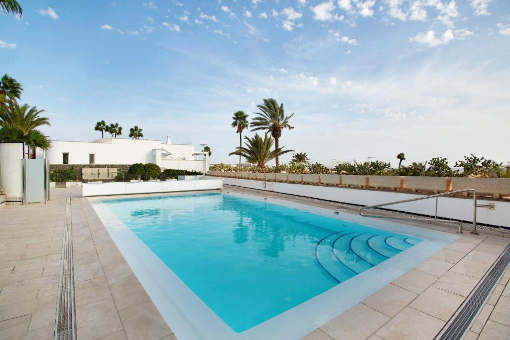 Bazén v ubytování Villa Dunas Maspalomas nebo v jeho okolí