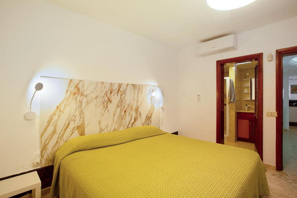 Postel nebo postele na pokoji v ubytování Villa Dunas Maspalomas